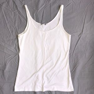 EXPRESS white tank top with seam down back.